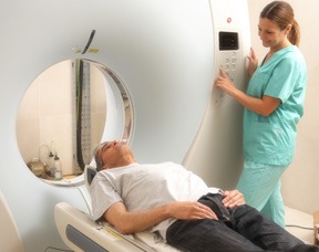 Man Being Image Scanned At Hospital