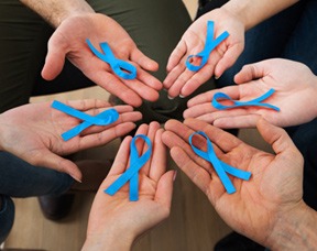 Prostate Cancer Ribbons in Peoples Hands