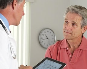 Doctor Explaining Prostate Cancer To Patient