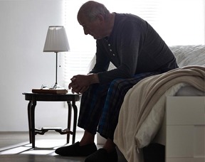 Man sitting with BPH Symptoms and Signs of BPH